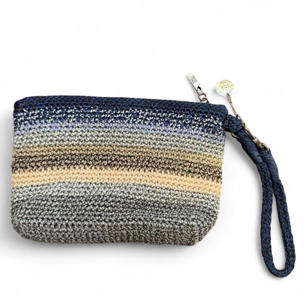 The Sak hand crochet vita wristlet in navy & tan with card slots & zipper pocket